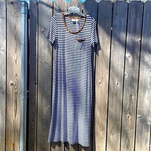 Chico’s size 0, small at Chico’s. Navy and white stripe with suede trim.